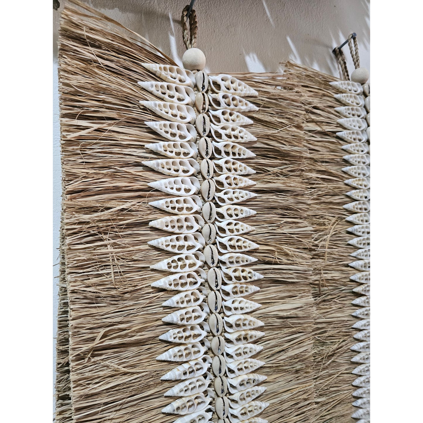 Seagrass wall deco tassels with shell accents