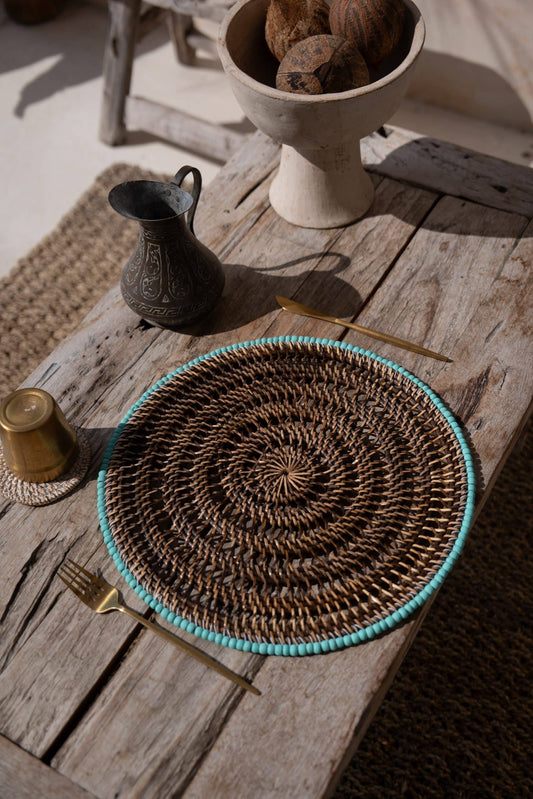 Rattan placemat with blue beads