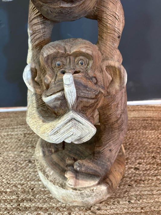 Three monkey wooden statue