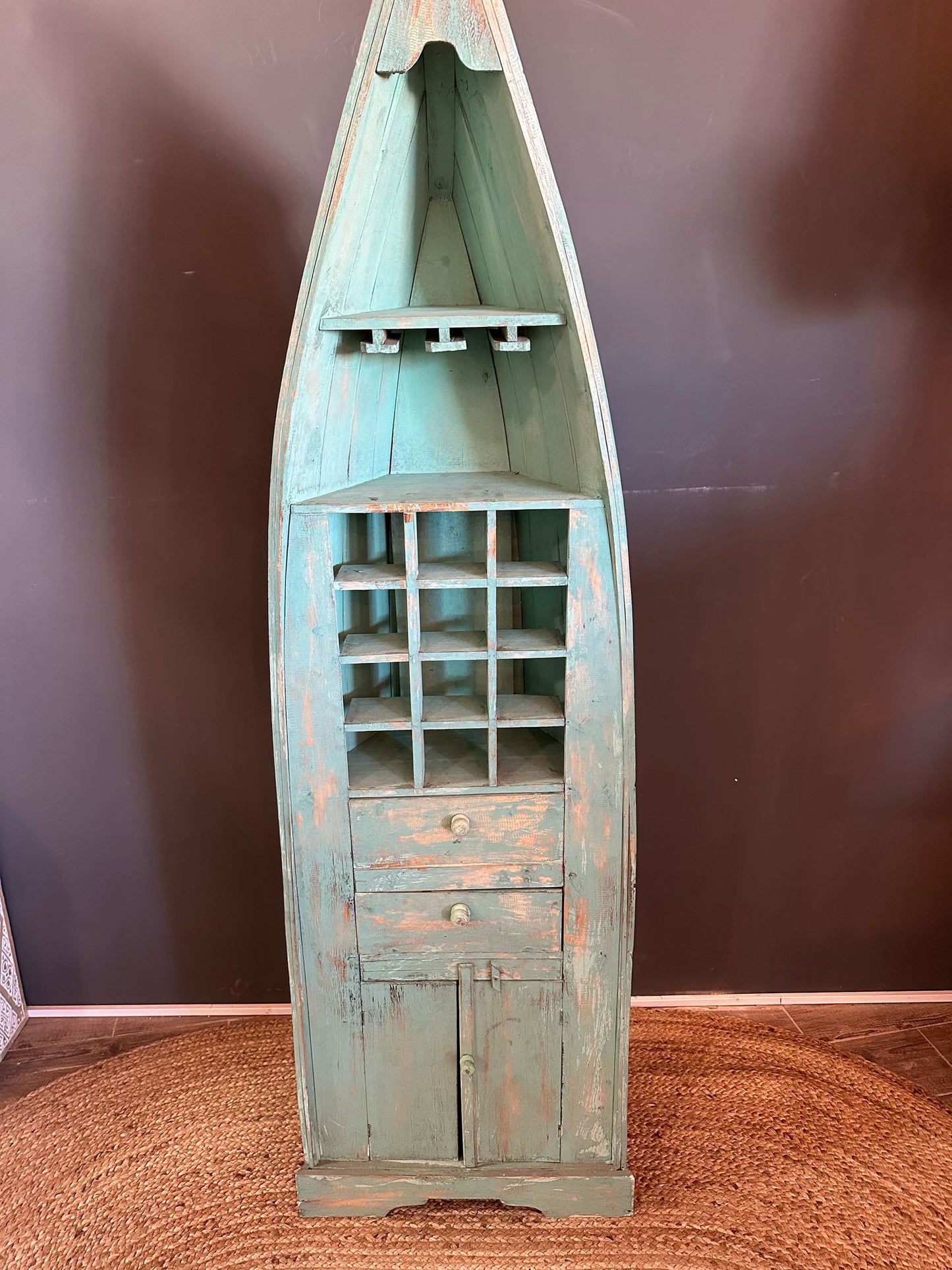Boat shaped cabinet color green