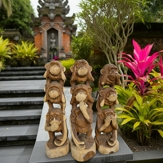 Three monkey wooden statue