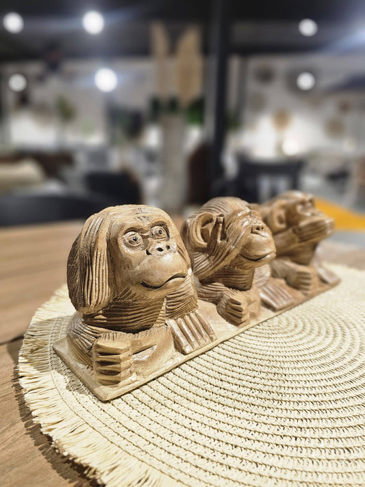 Sea no evil, hear no evil monkeys in a row