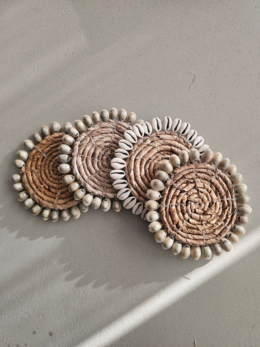 Banana leaf coaster with shells