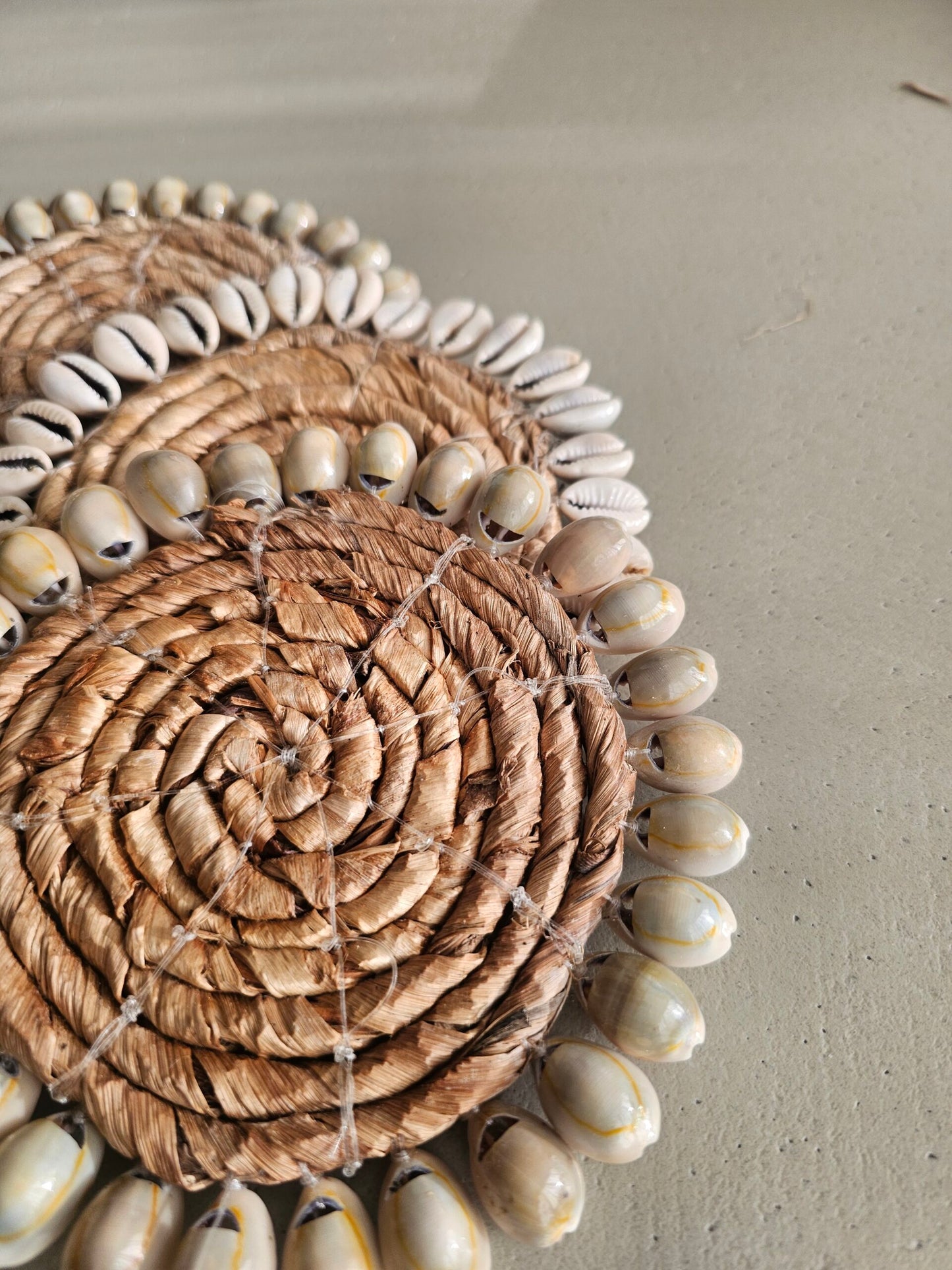 Banana leaf coaster with shells