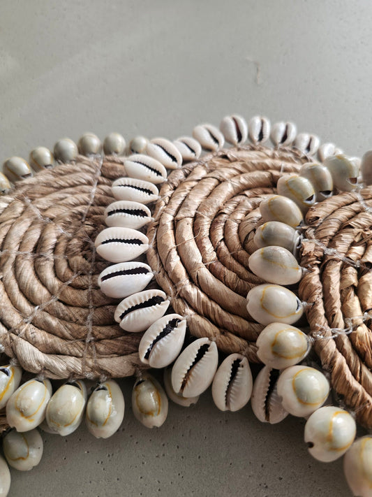 Banana leaf coaster with shells