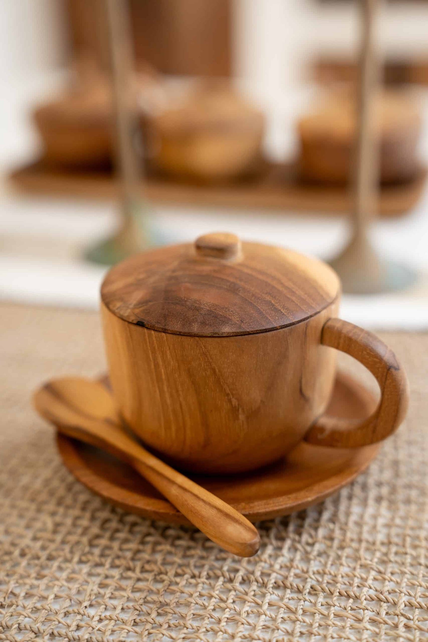 Wooden cup with lit and spoon