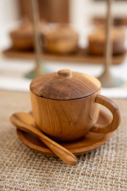 Wooden cup with lit and spoon