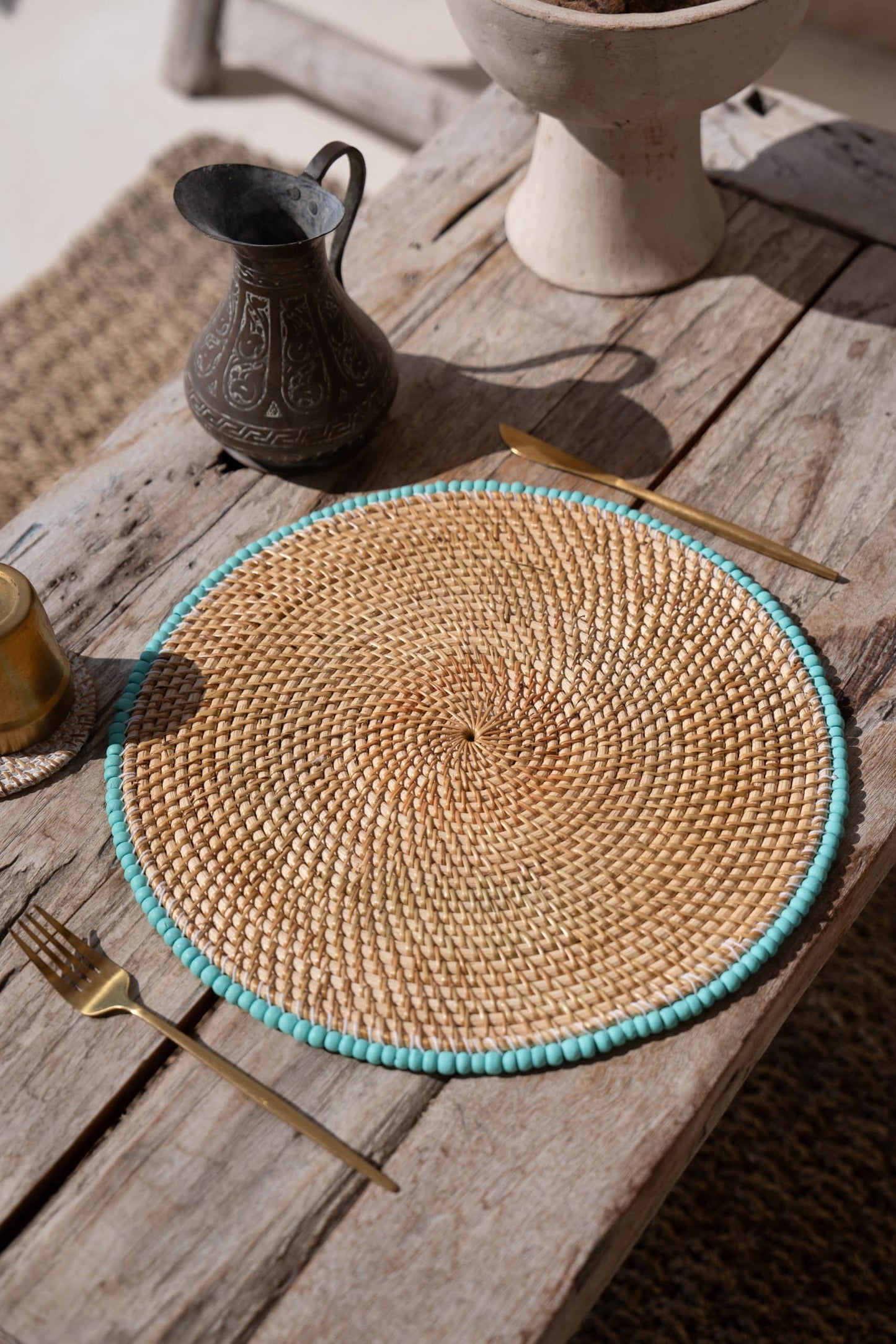 Rattan placemat with blue beads
