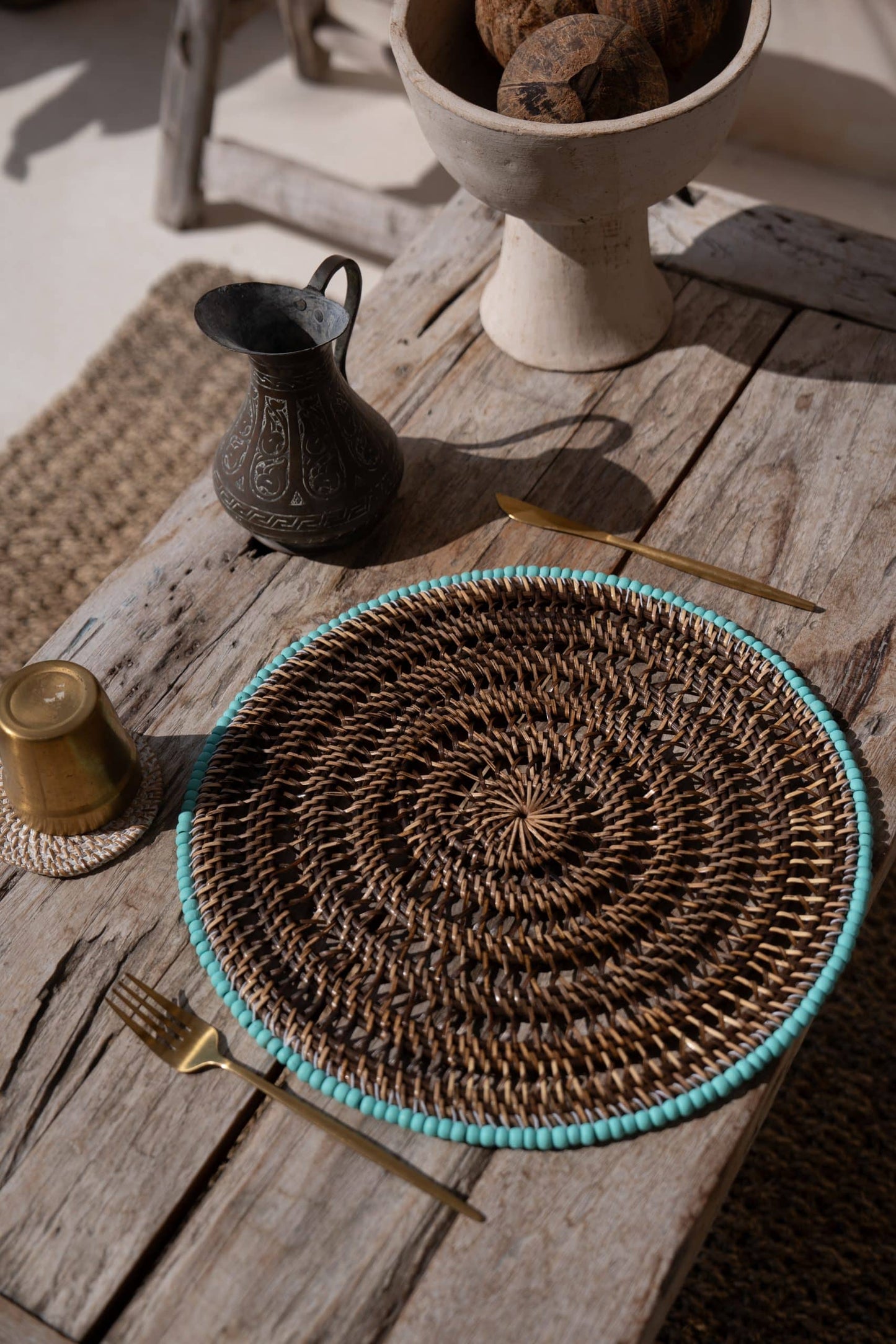 Rattan placemat with blue beads