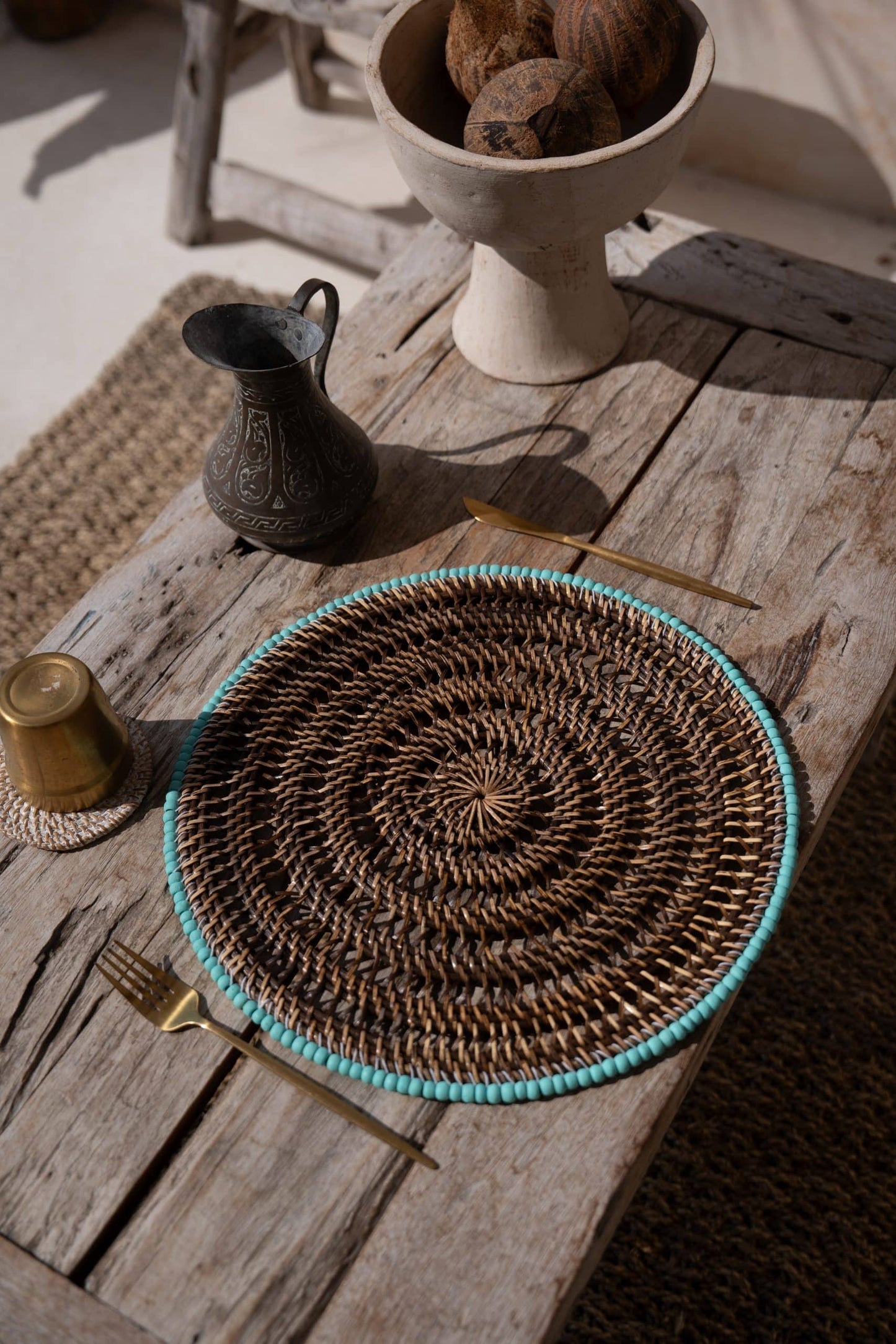 Rattan placemat with blue beads