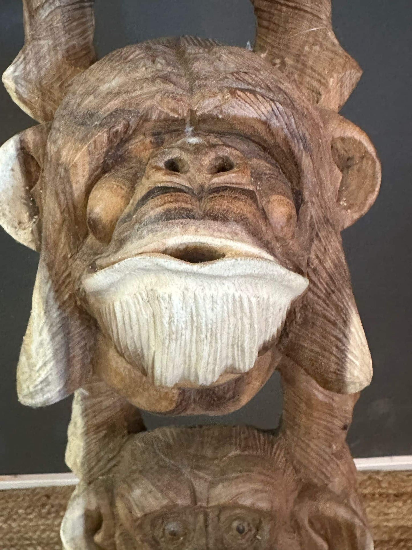 Three monkey wooden statue