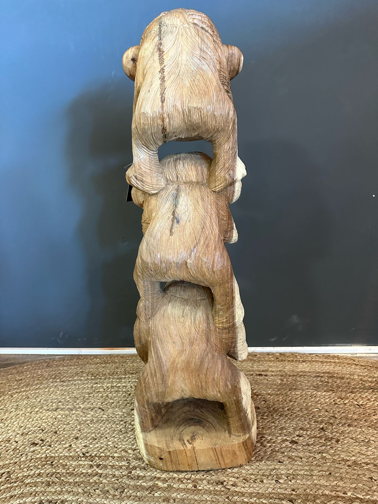 Three monkey wooden statue
