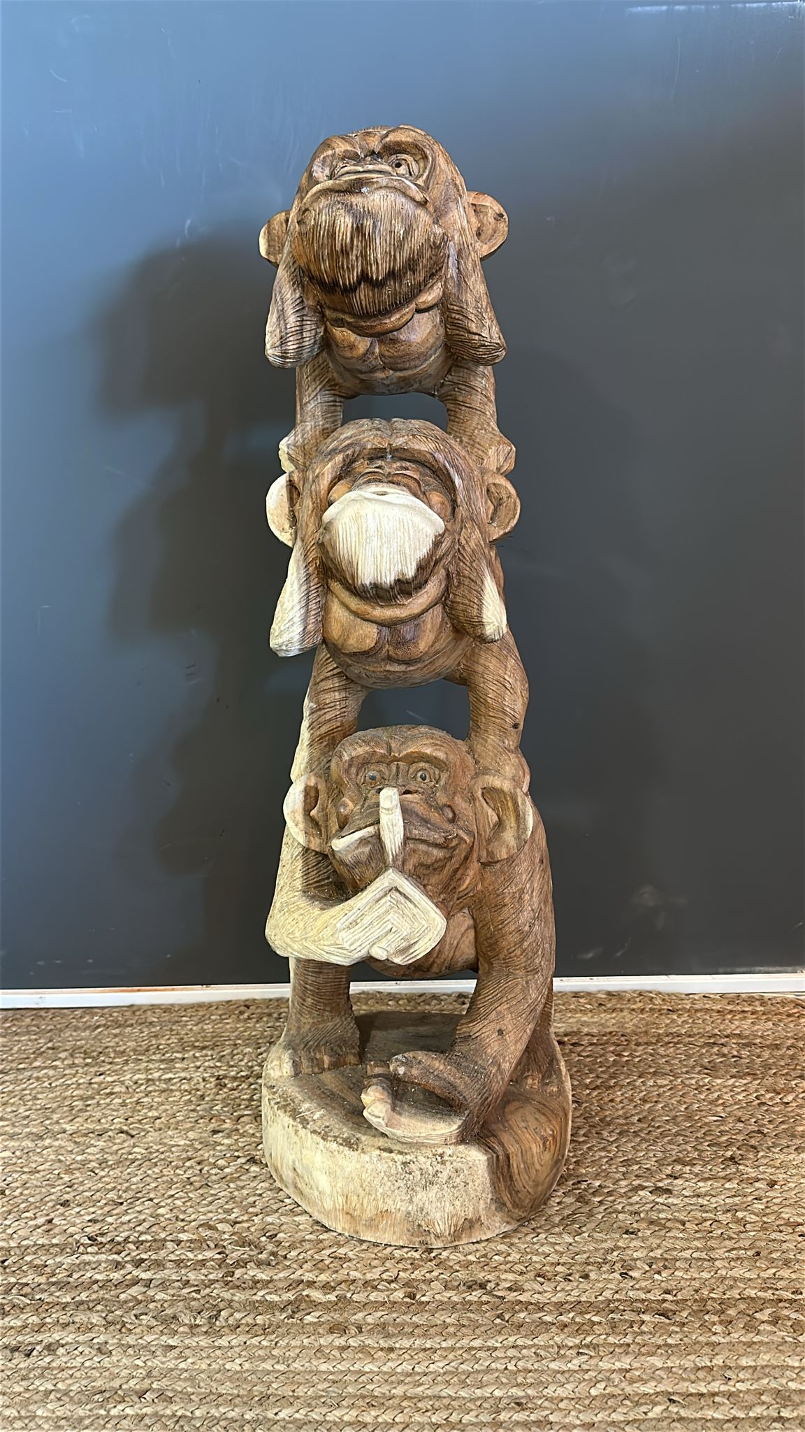 Three monkey wooden statue