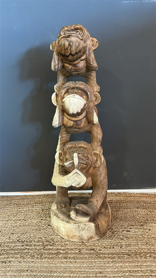 Three monkey wooden statue
