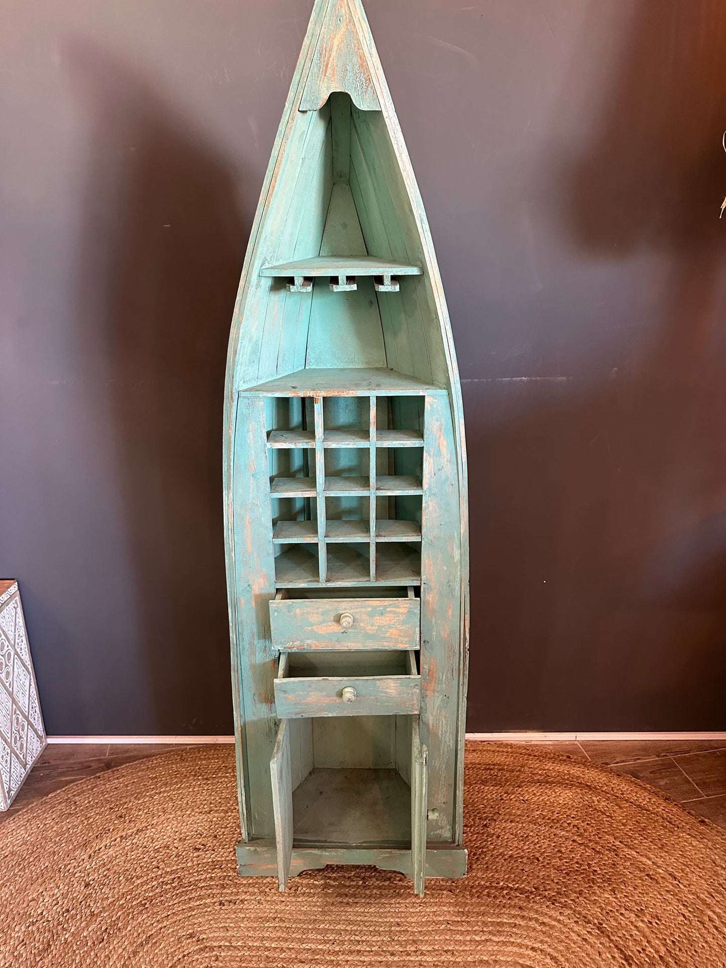 Boat shaped cabinet color green