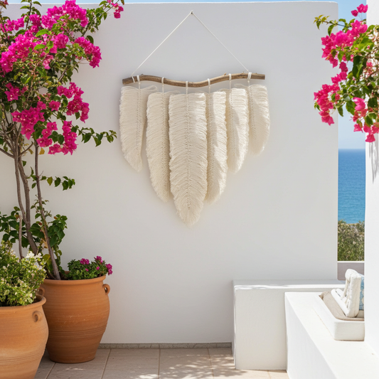 Macrame wall hanging feathers on a stick